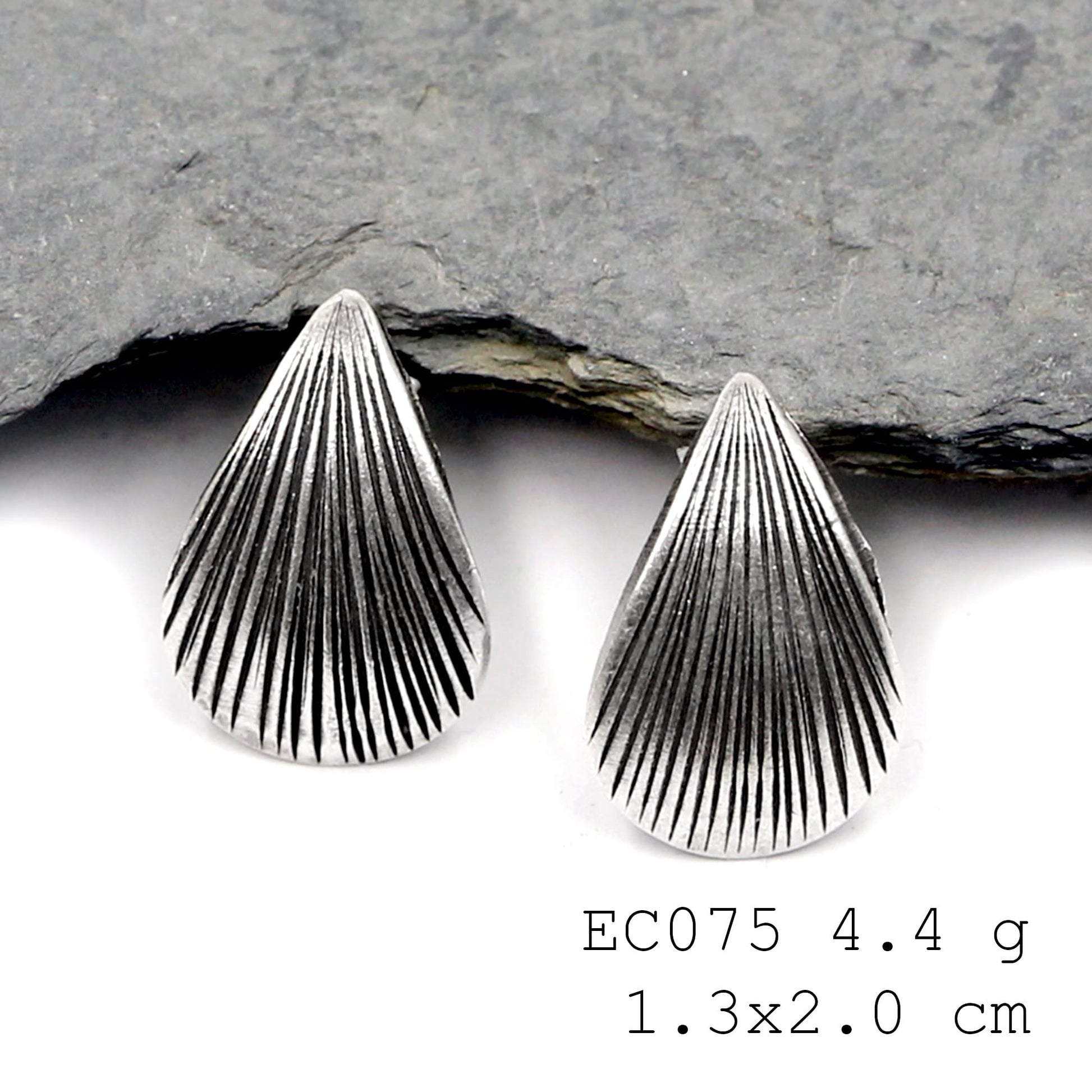 Created, not manufactured. Your new silver earrings.