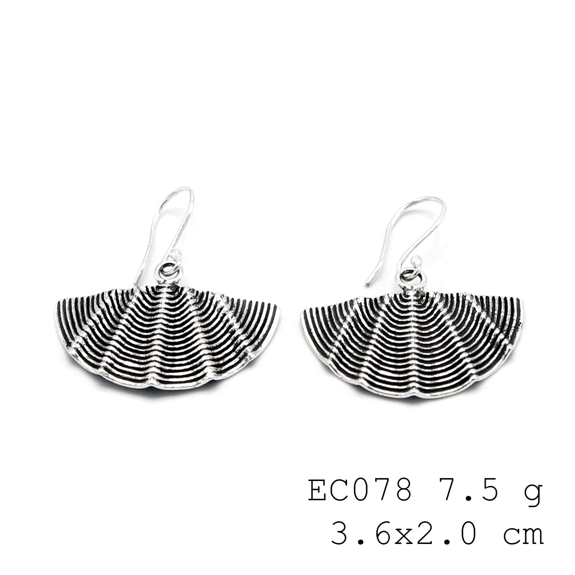 Slow and steady style. Unique silver earrings.
