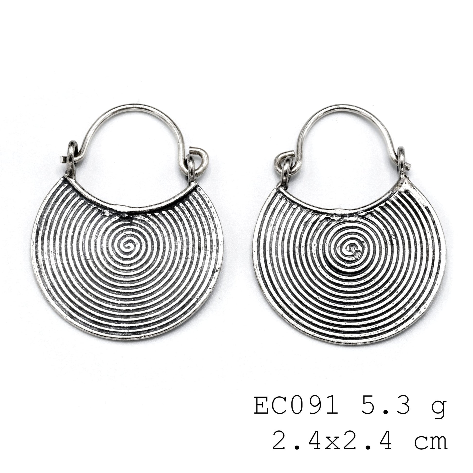 Crafted by hand, worn by you. Silver earrings.