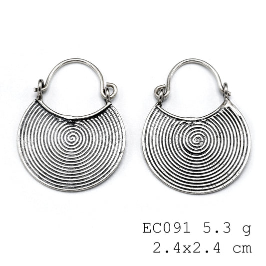 Crafted by hand, worn by you. Silver earrings.