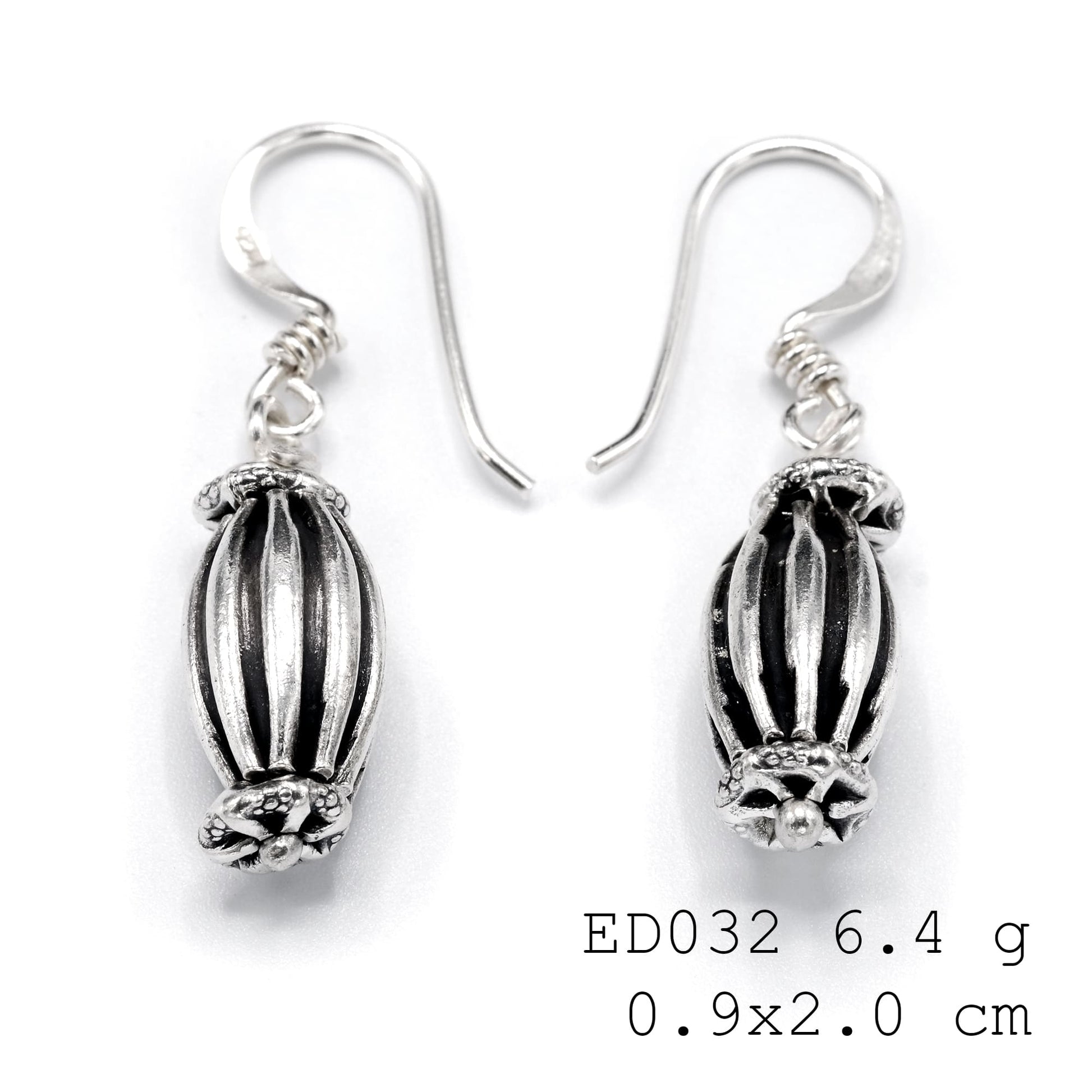 Small balls, big style impact. These silver earrings are essential.