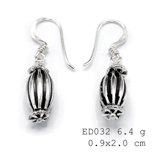 Small balls, big style impact. These silver earrings are essential.