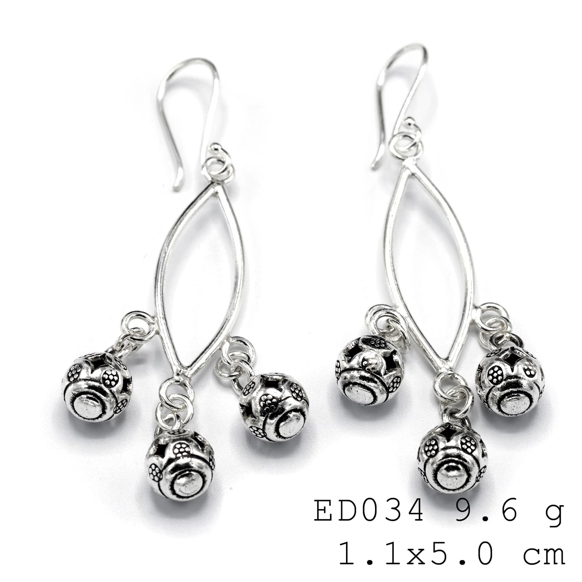 Shining brightly on your lobe. These classic silver earrings are forever.