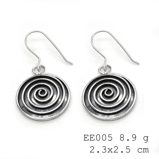 The intricate texture is everything. These silver earrings pop!