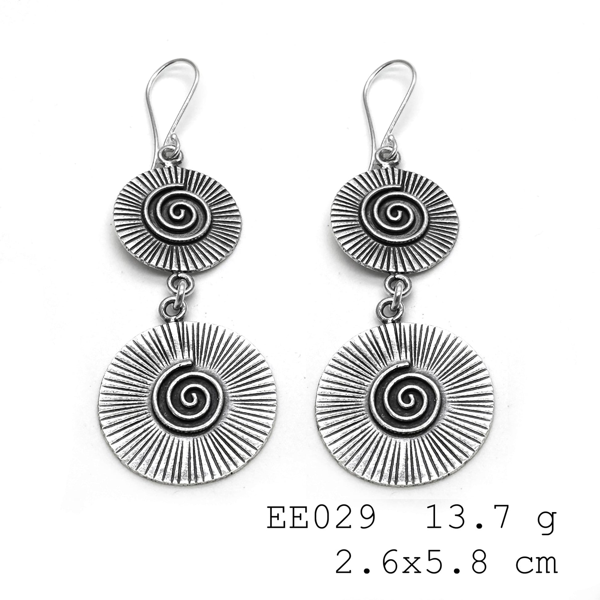 Wrap your look in style with these silver earrings.
