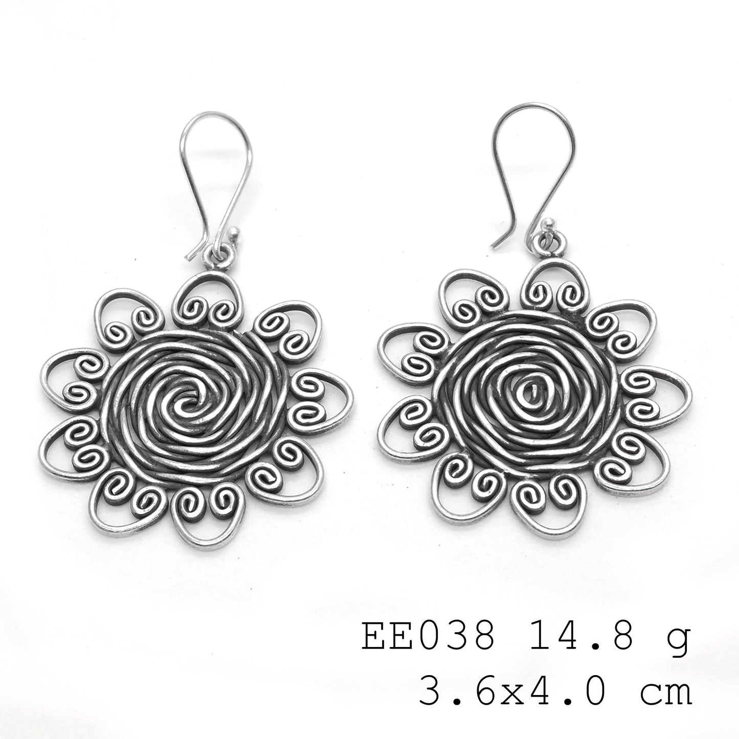 Intricately wound style. Get your hands on these silver earrings.