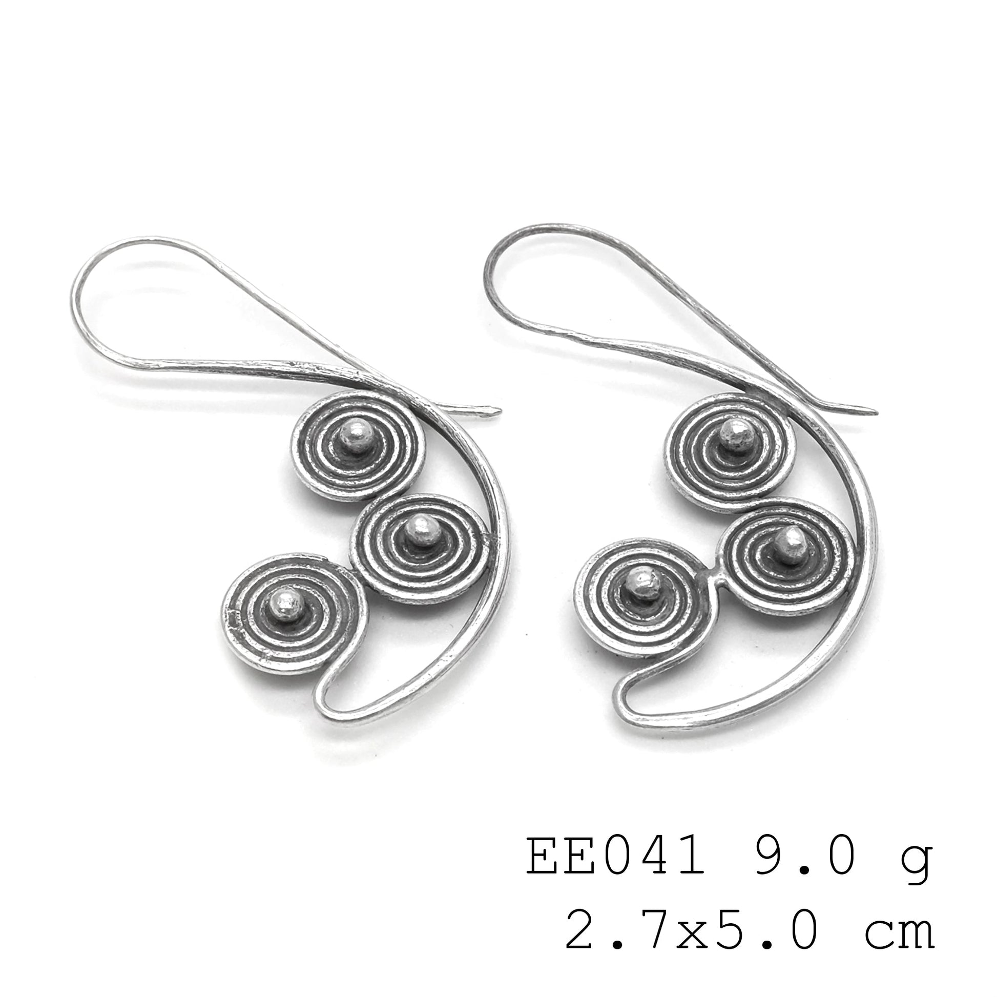 Wrapped in elegance. Adore this unique pair of silver earrings.