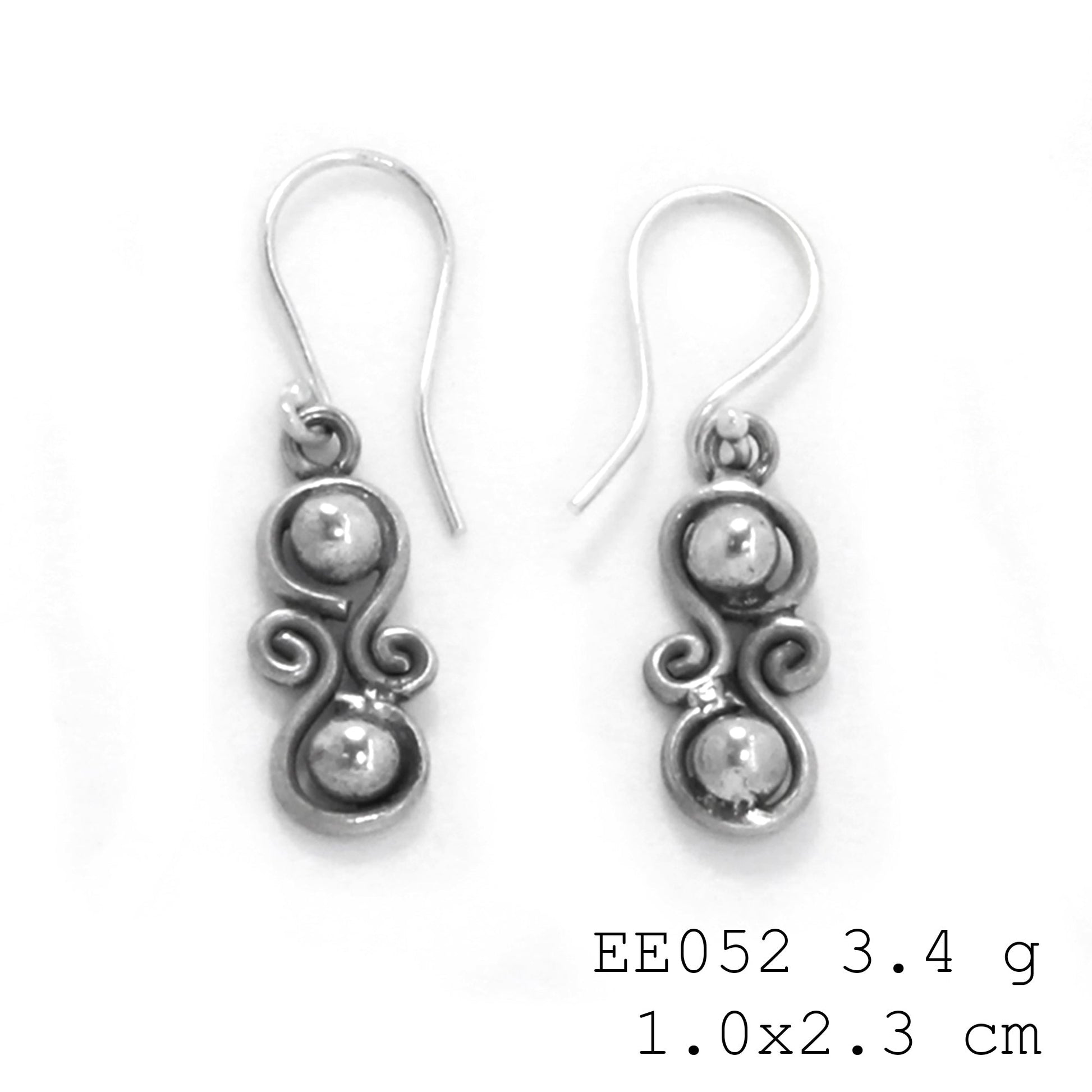 Modern art meets jewelry. Check out these coiled silver earrings.