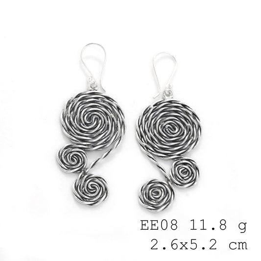 Intricate twists, endless style. These silver earrings are captivating.