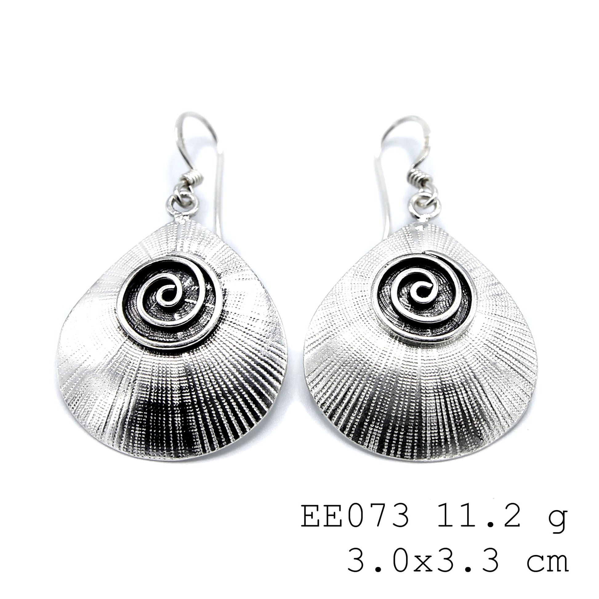Coil power! These silver earrings are uniquely beautiful.