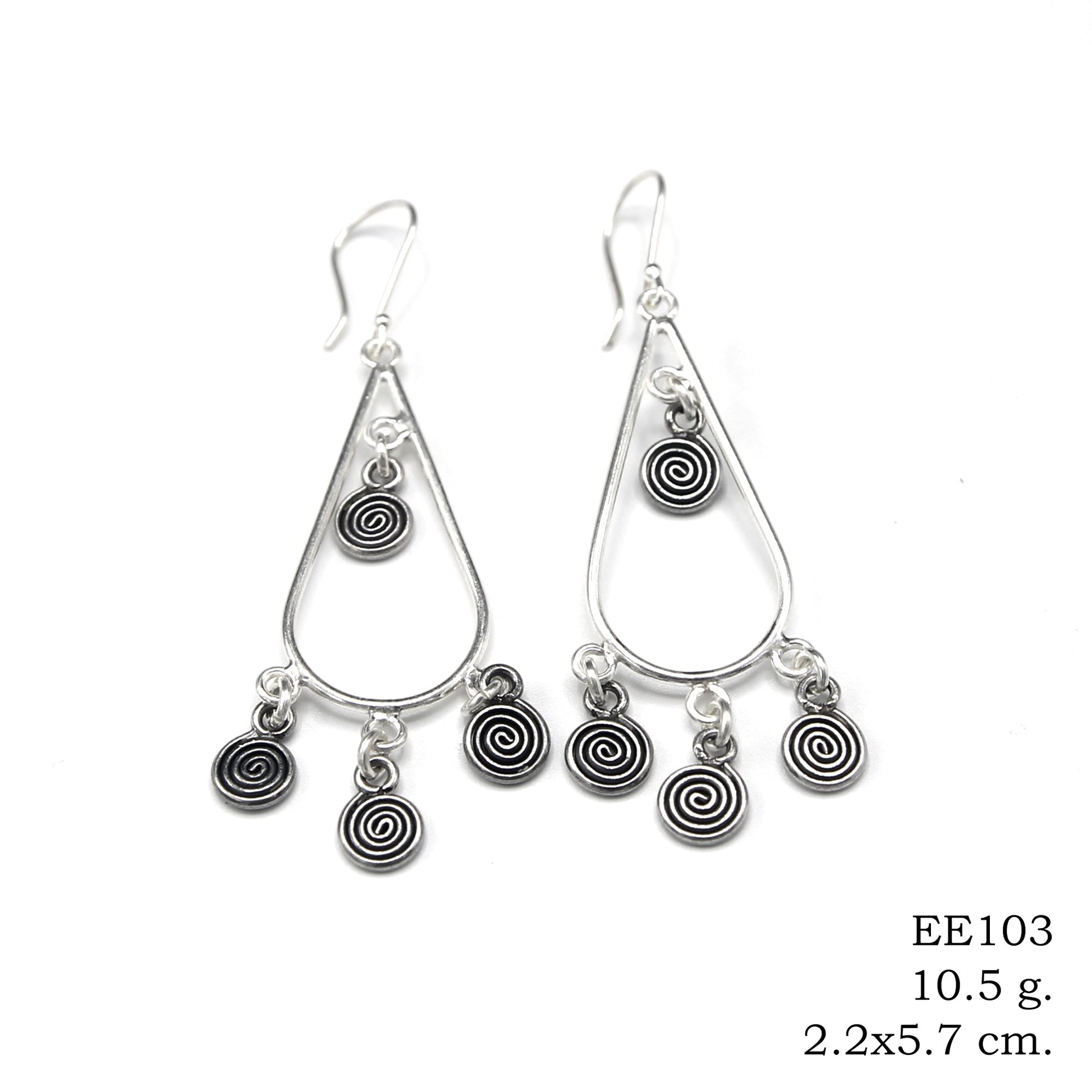 Twisted to perfection. These coil silver earrings elevate your look.