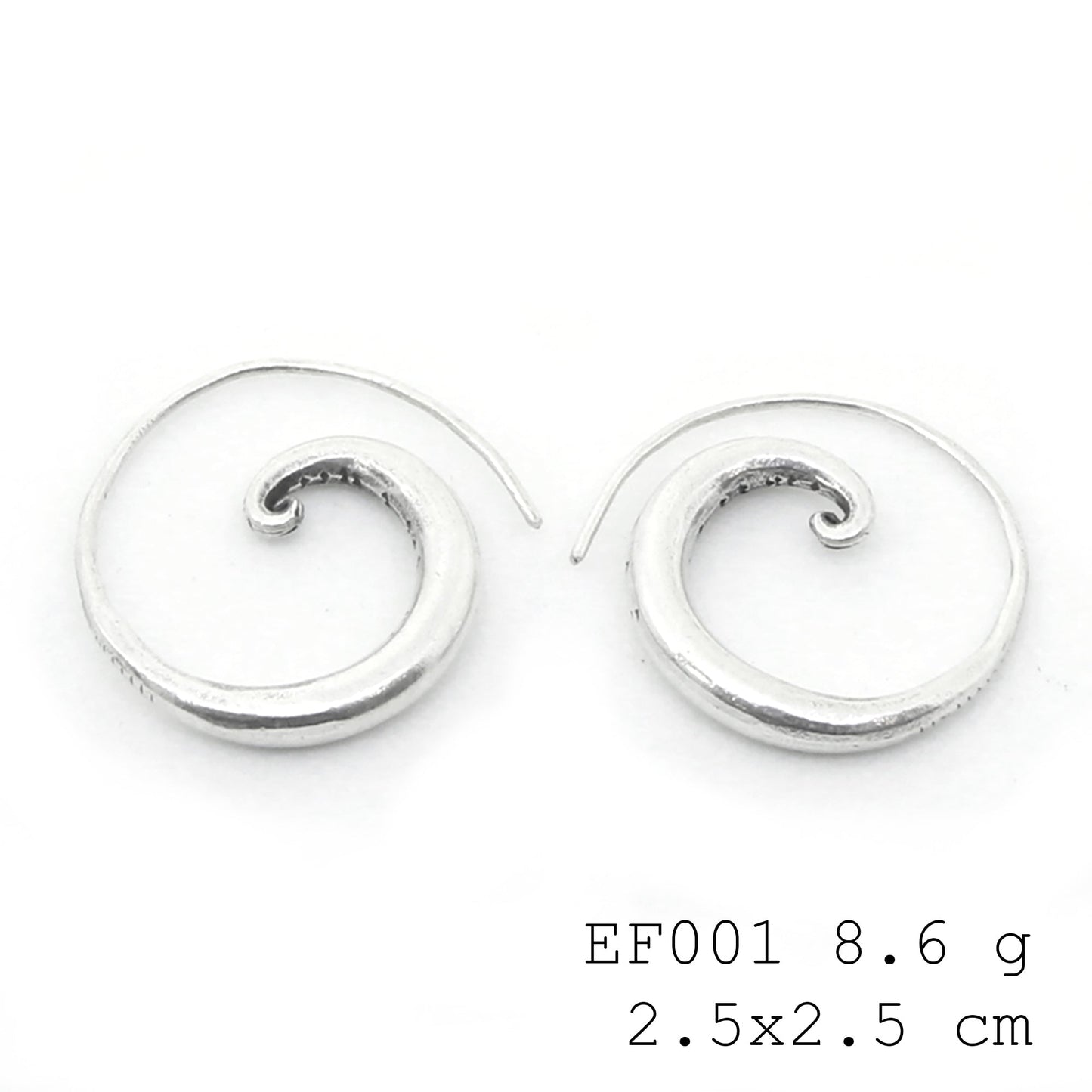 Art you can wear. These spiral silver earrings are a masterpiece.