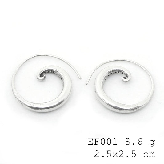 Art you can wear. These spiral silver earrings are a masterpiece.