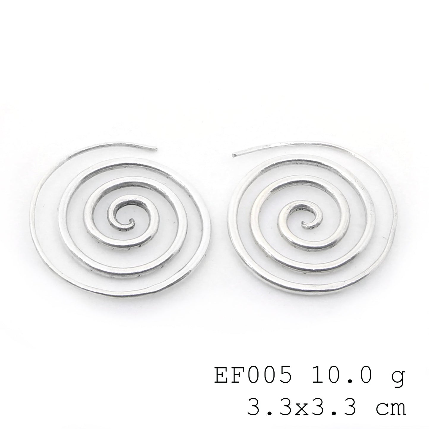 Circular chic. Rocking these spiral silver earrings today.