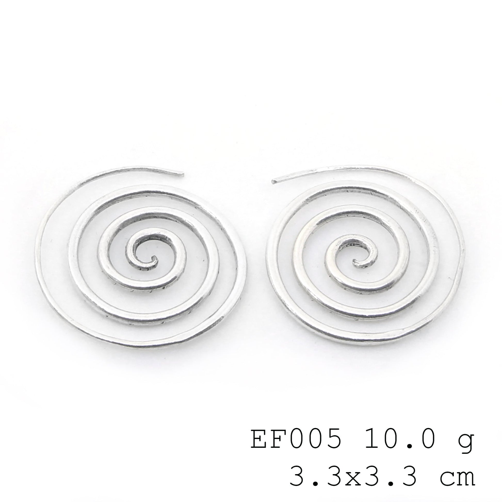 Circular chic. Rocking these spiral silver earrings today.