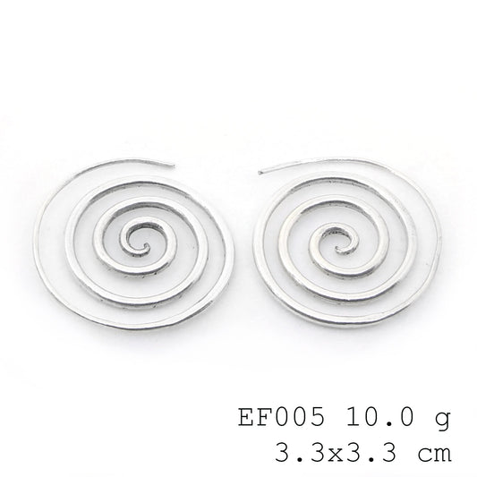 Circular chic. Rocking these spiral silver earrings today.