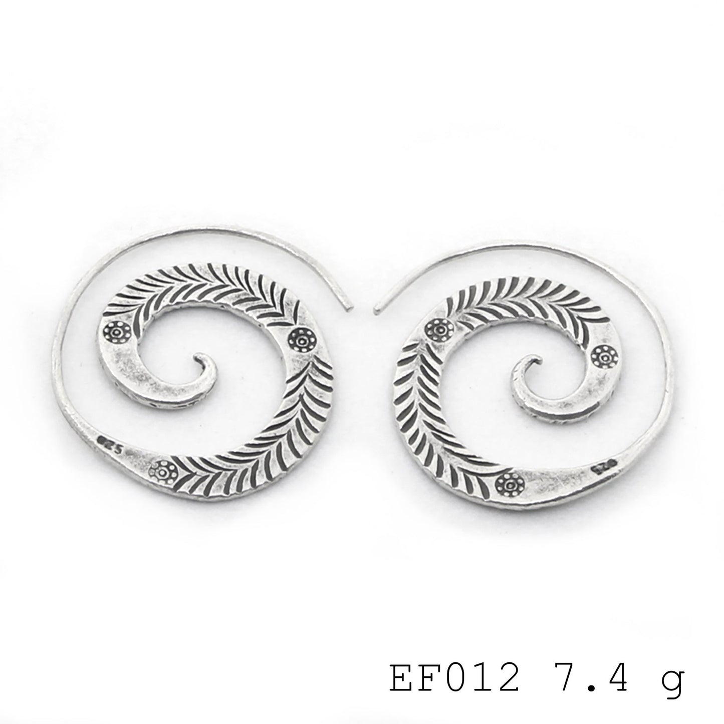 Hypnotic design, effortless elegance. These silver earrings are magic.