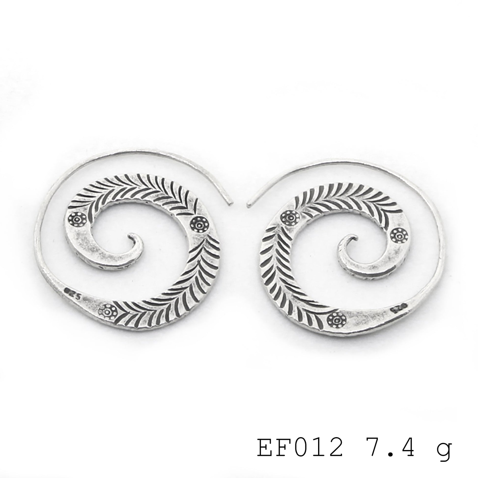 Hypnotic design, effortless elegance. These silver earrings are magic.
