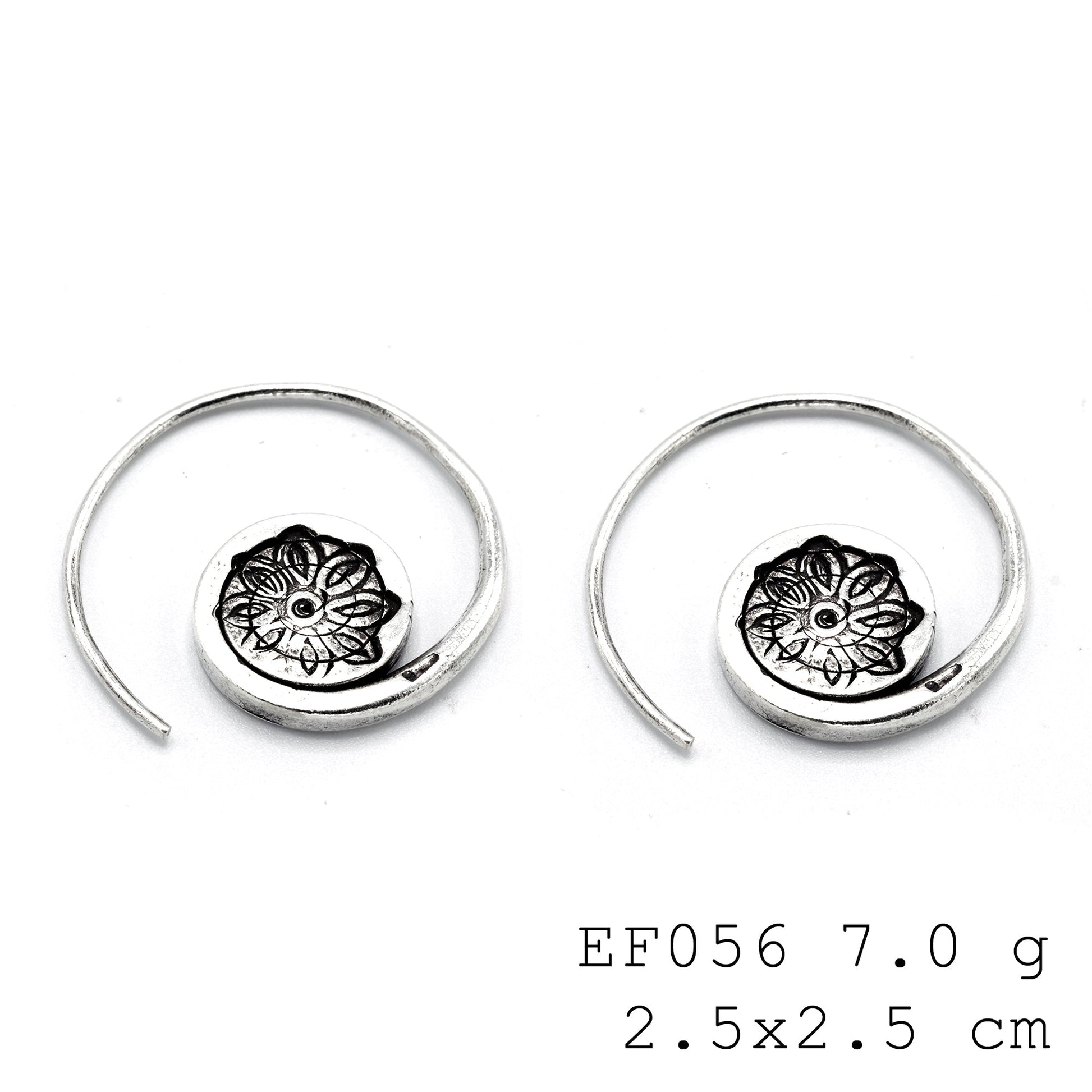 A stylish curve for your ear stack. Must-have silver earrings.