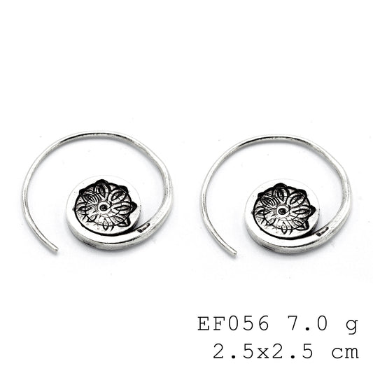 A stylish curve for your ear stack. Must-have silver earrings.