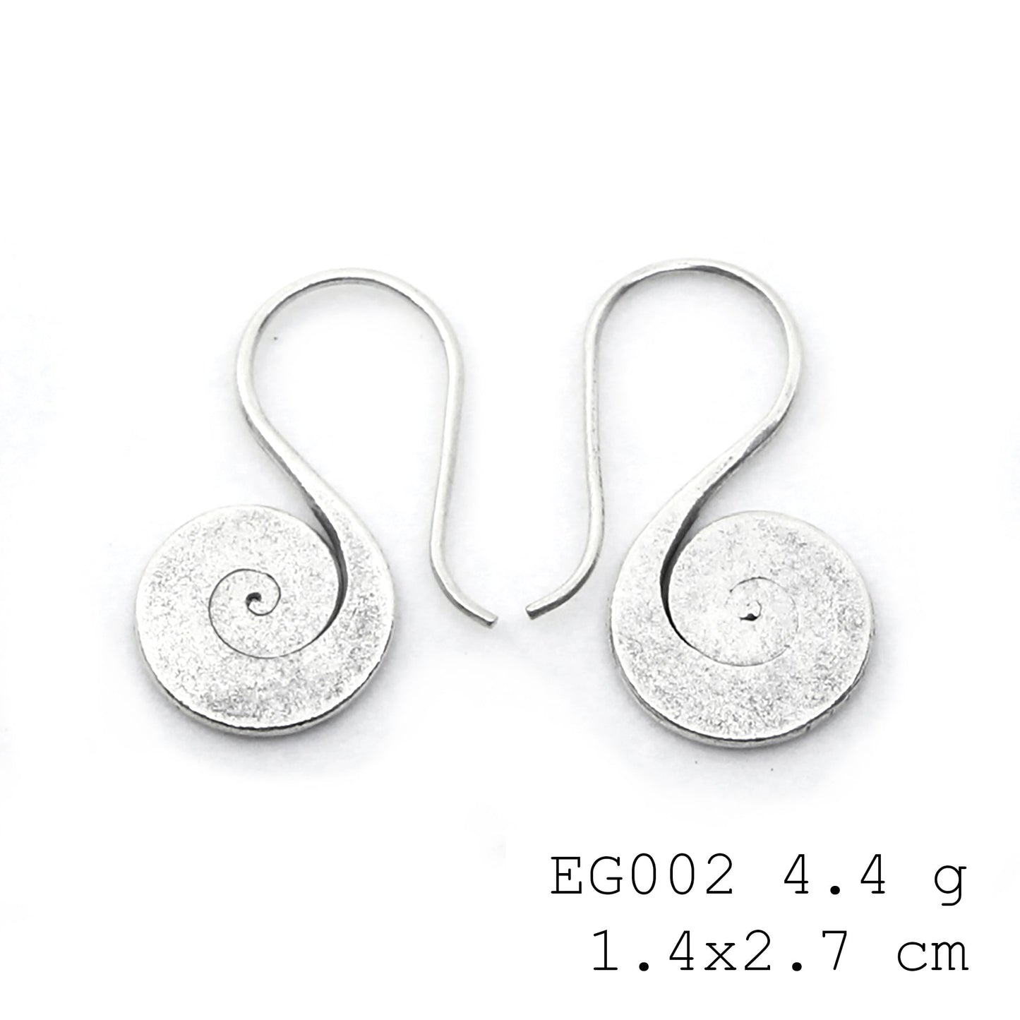 Pure silver, pure heart: handmade silver earrings.