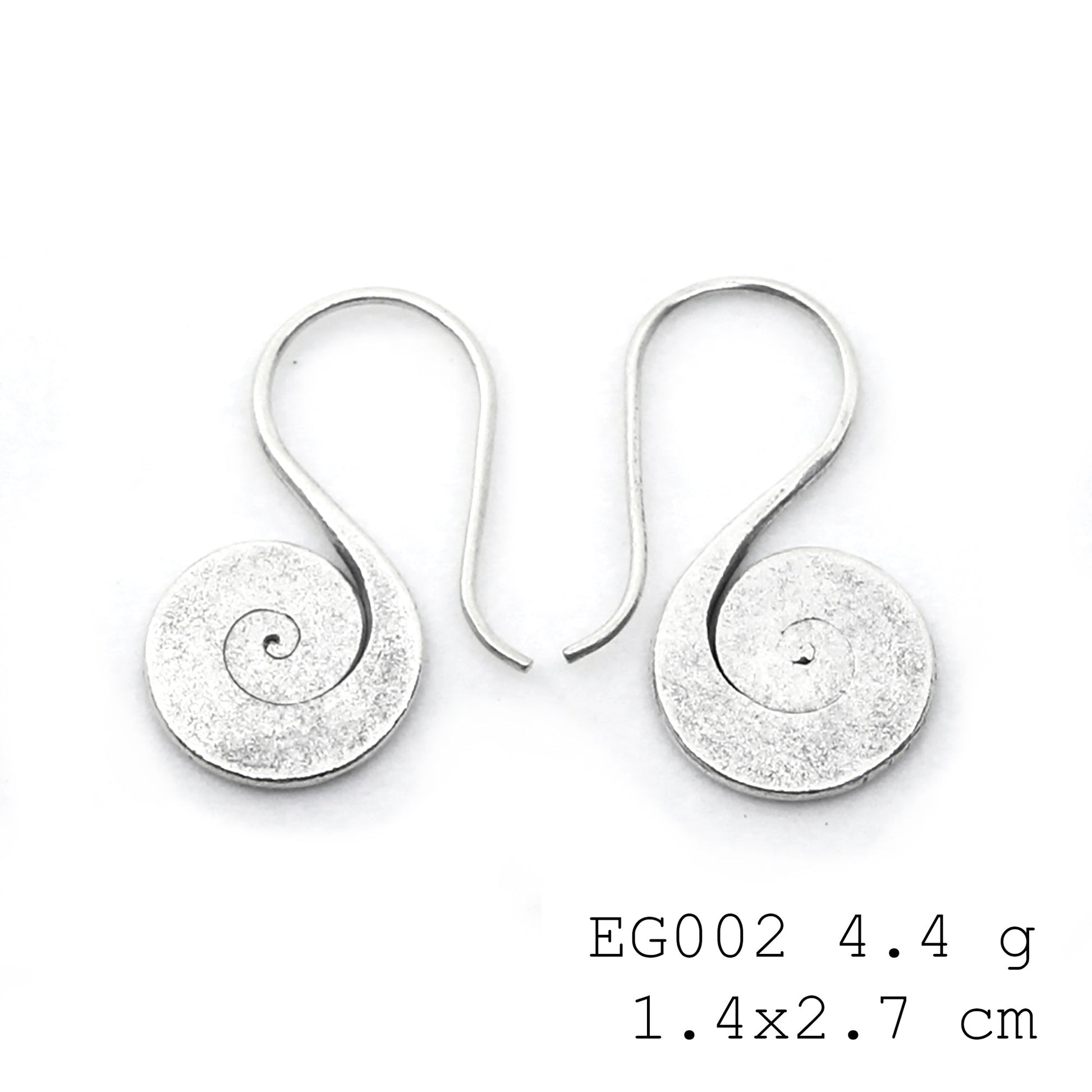 Pure silver, pure heart: handmade silver earrings.