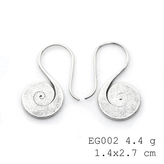 Pure silver, pure heart: handmade silver earrings.