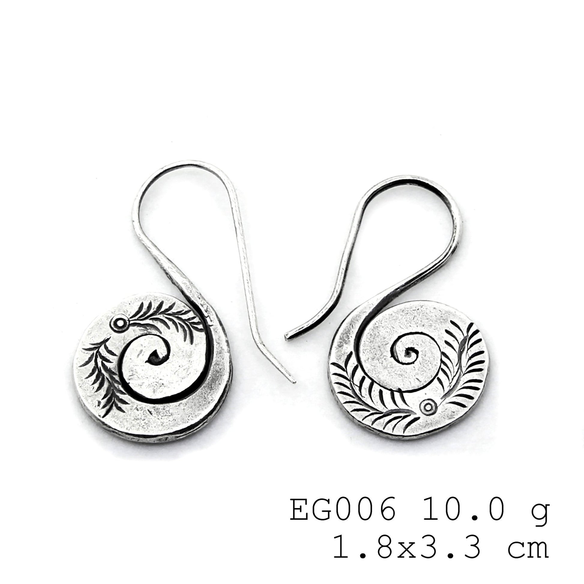 Elevate your look with these silver earrings.