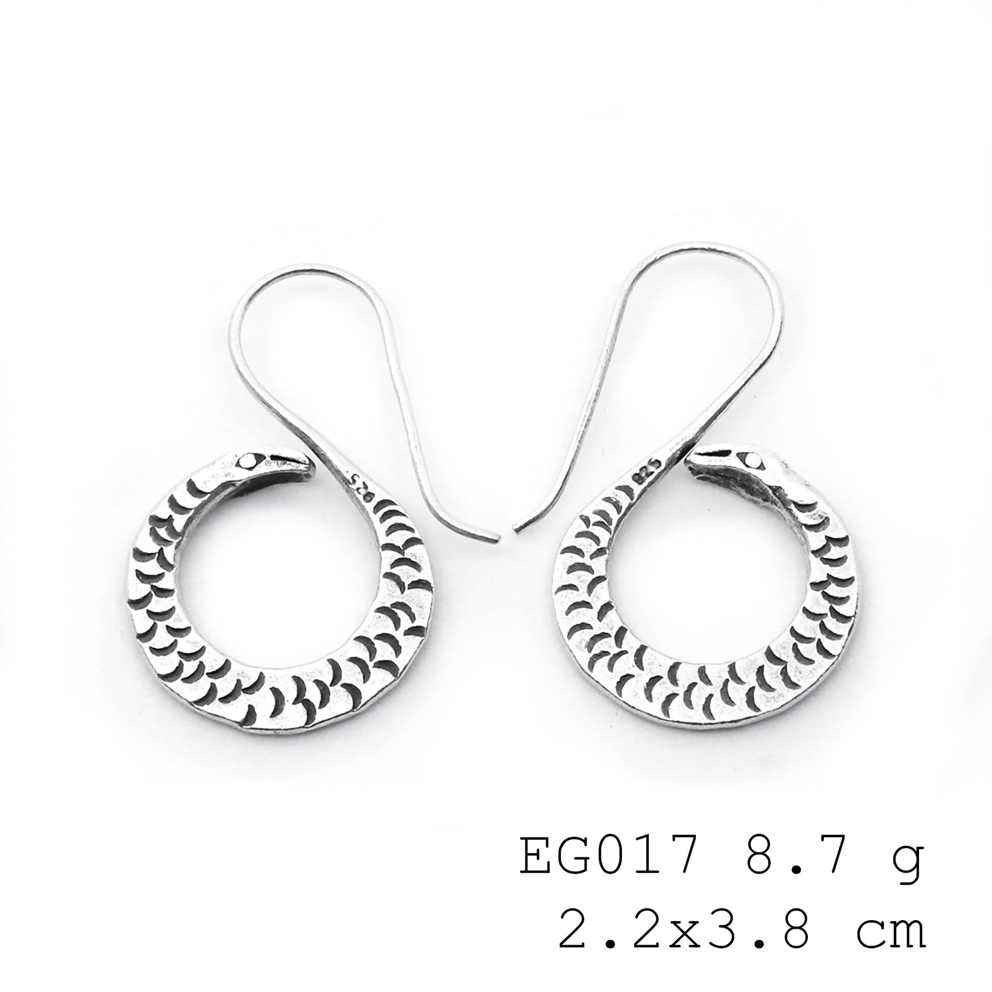 Crafted with care: hang-shape silver earrings.