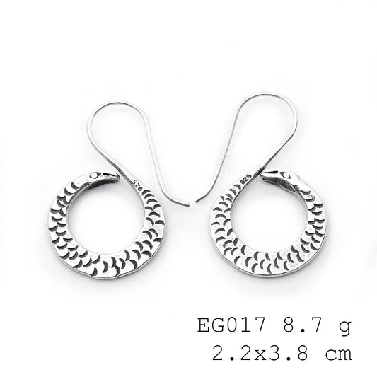 Crafted with care: hang-shape silver earrings.