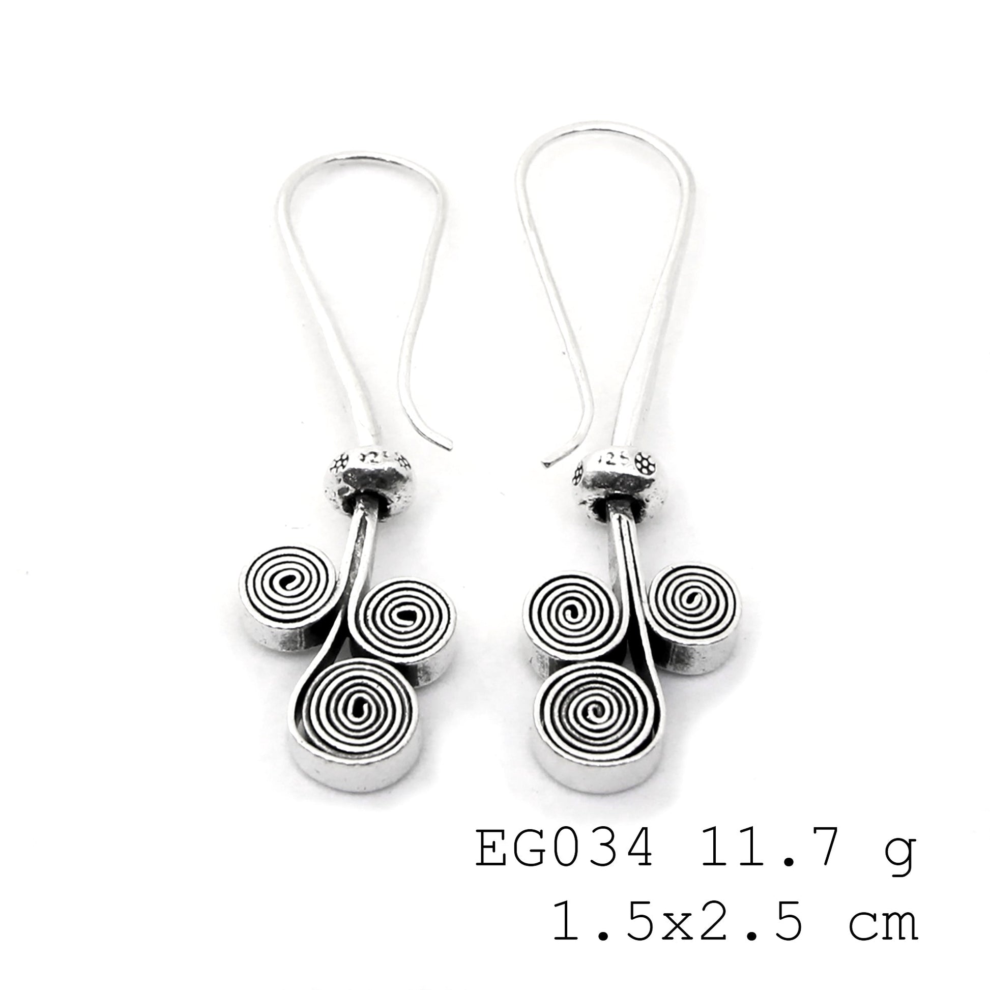 One-of-a-kind handmade silver earrings.