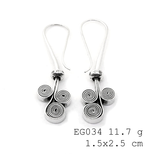 One-of-a-kind handmade silver earrings.