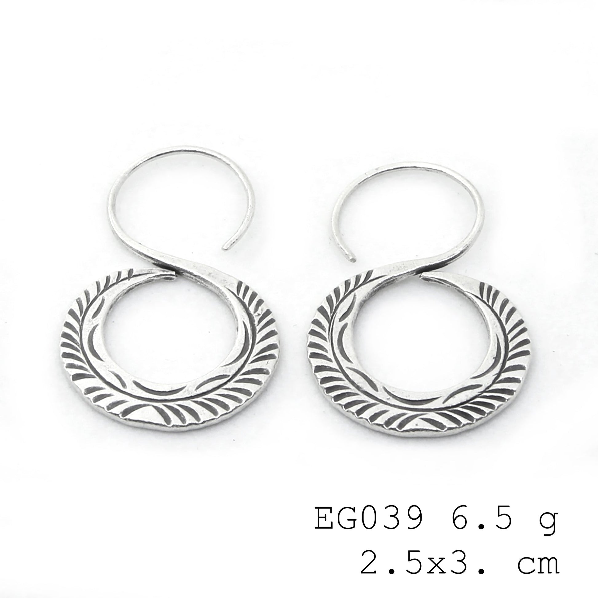 Catch the light with these silver earrings.