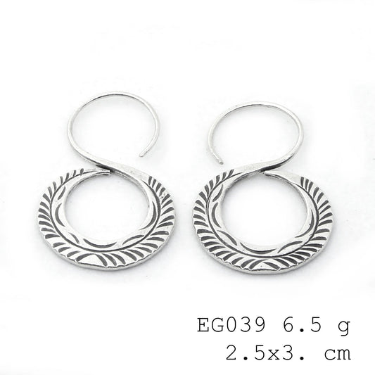 Catch the light with these silver earrings.
