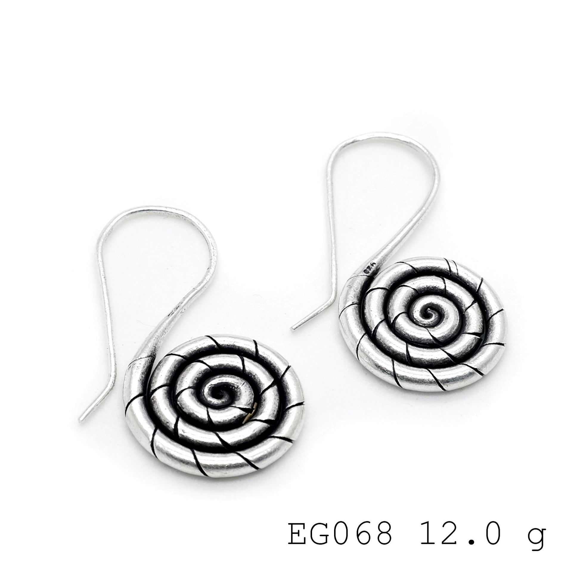 Statement style in pure silver earrings.