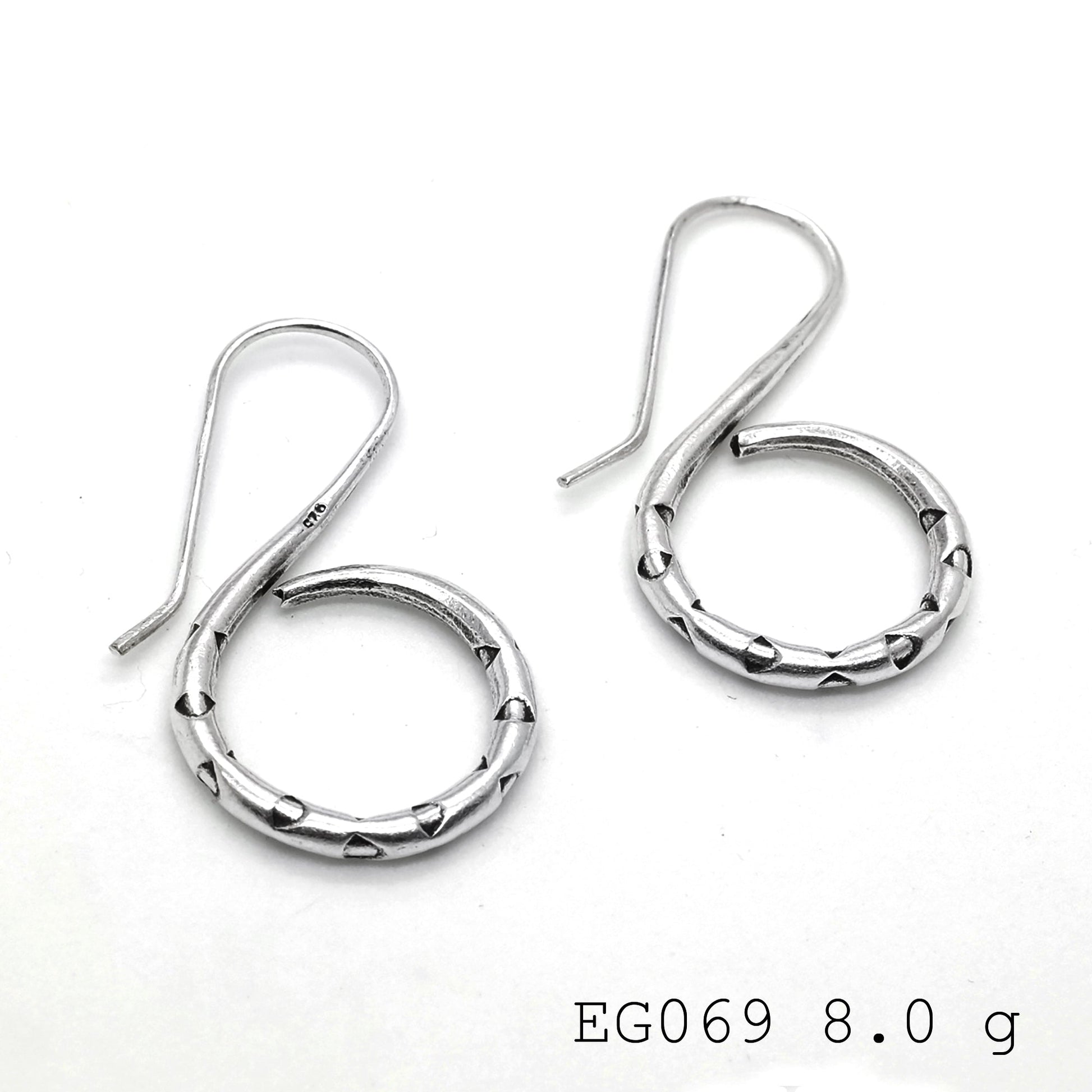Solid style: pure silver earrings.
