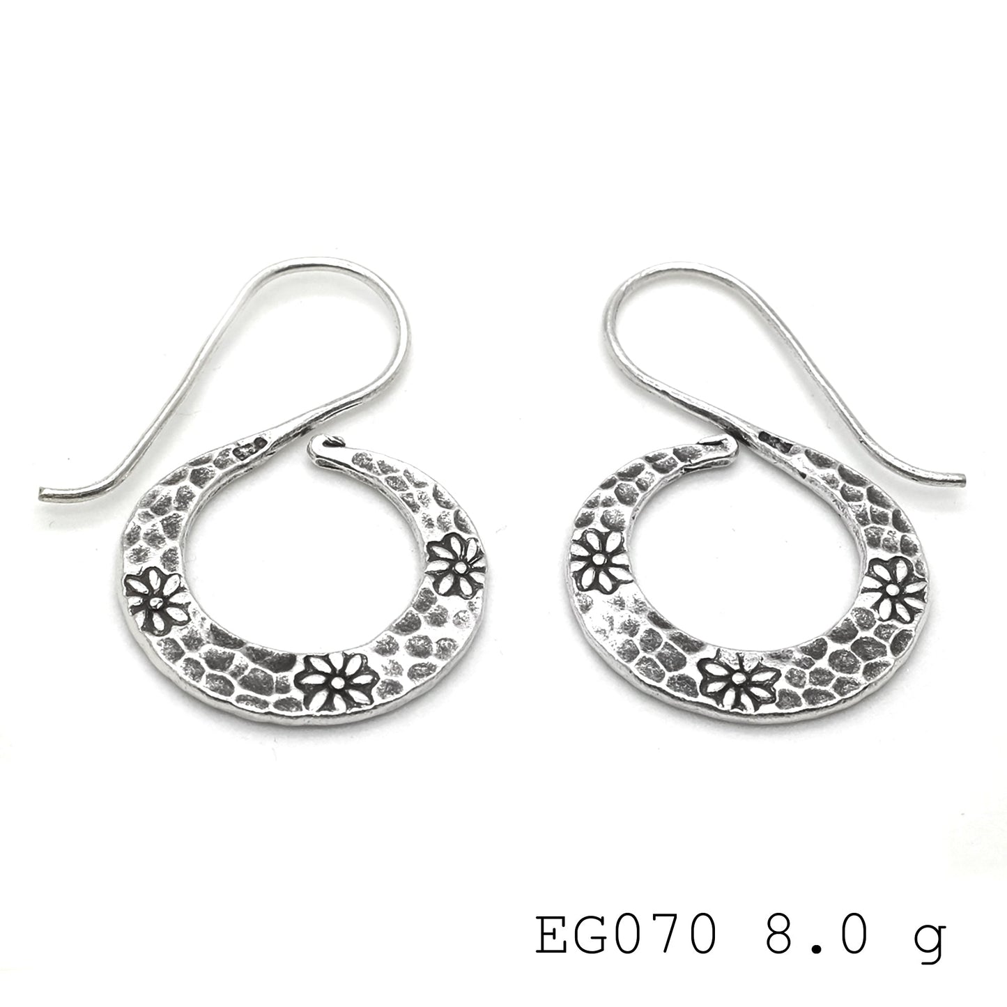 Add a glow with these silver earrings.