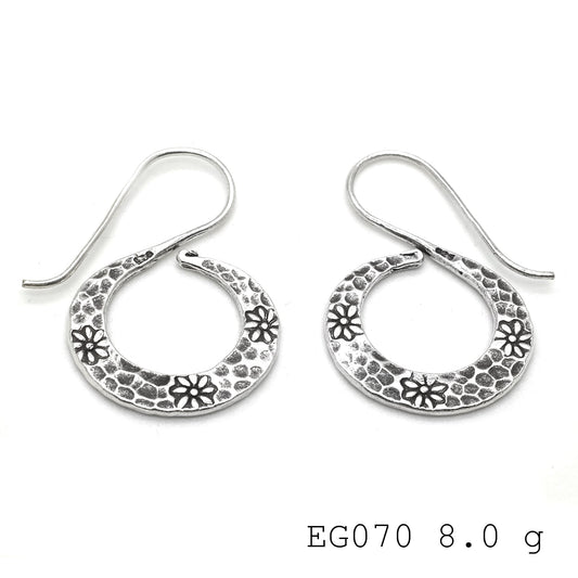 Add a glow with these silver earrings.