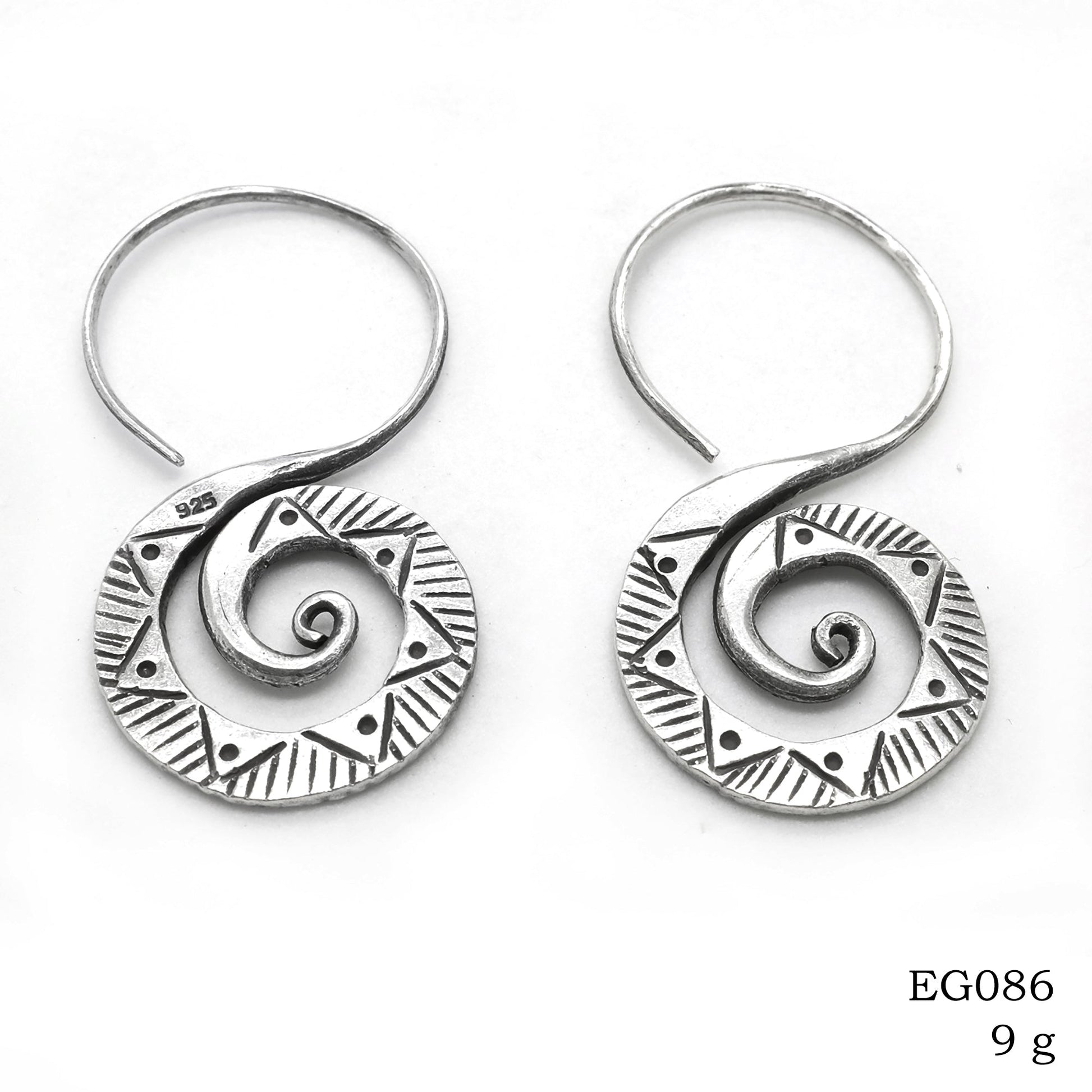 Boldly silver: hang silver earrings.