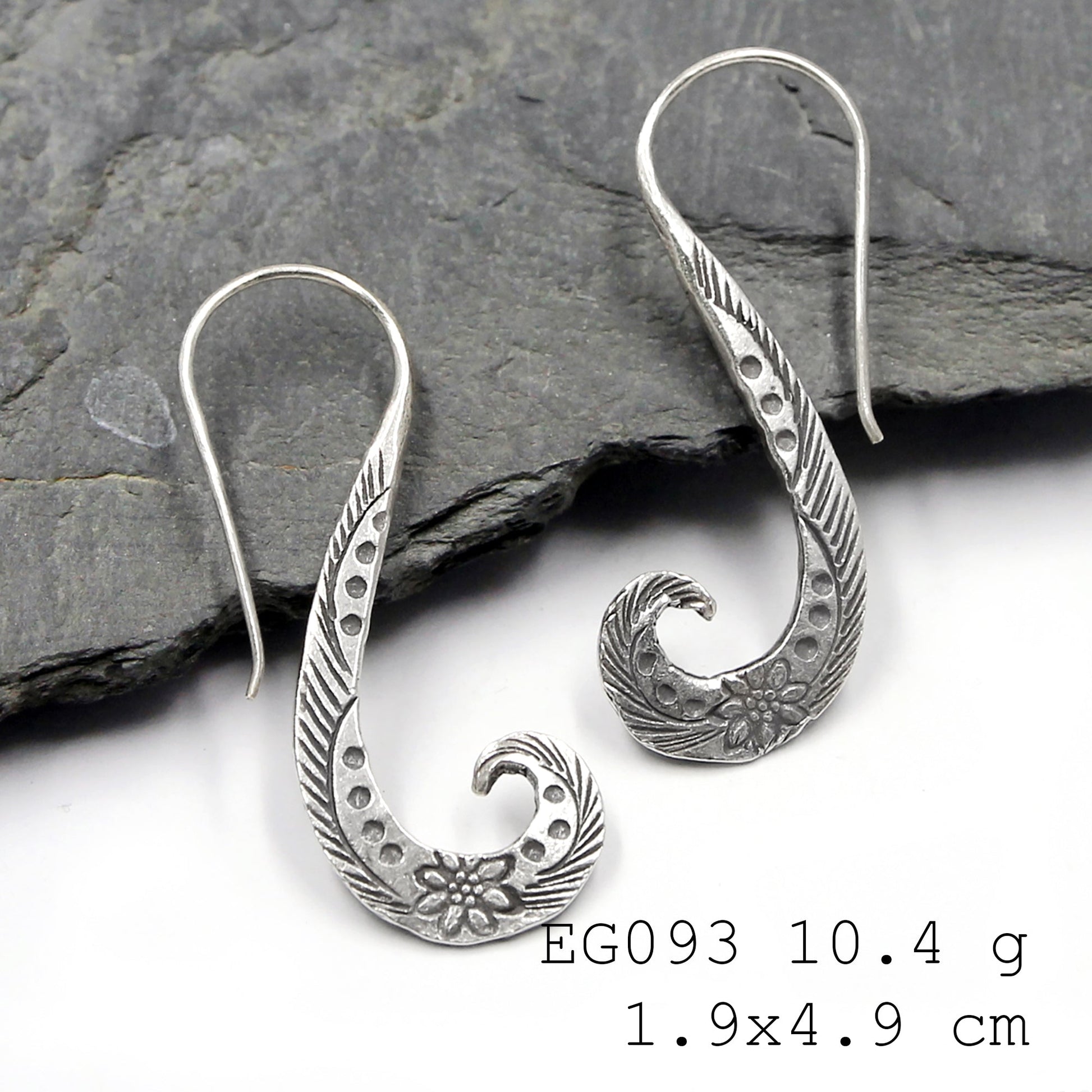 Just pure, handmade silver earrings.