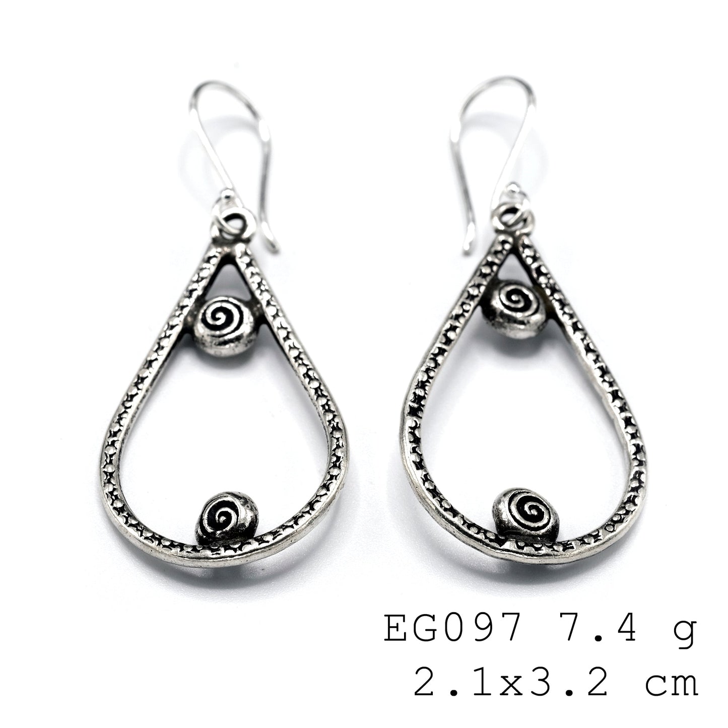 Refined grace in silver earrings.