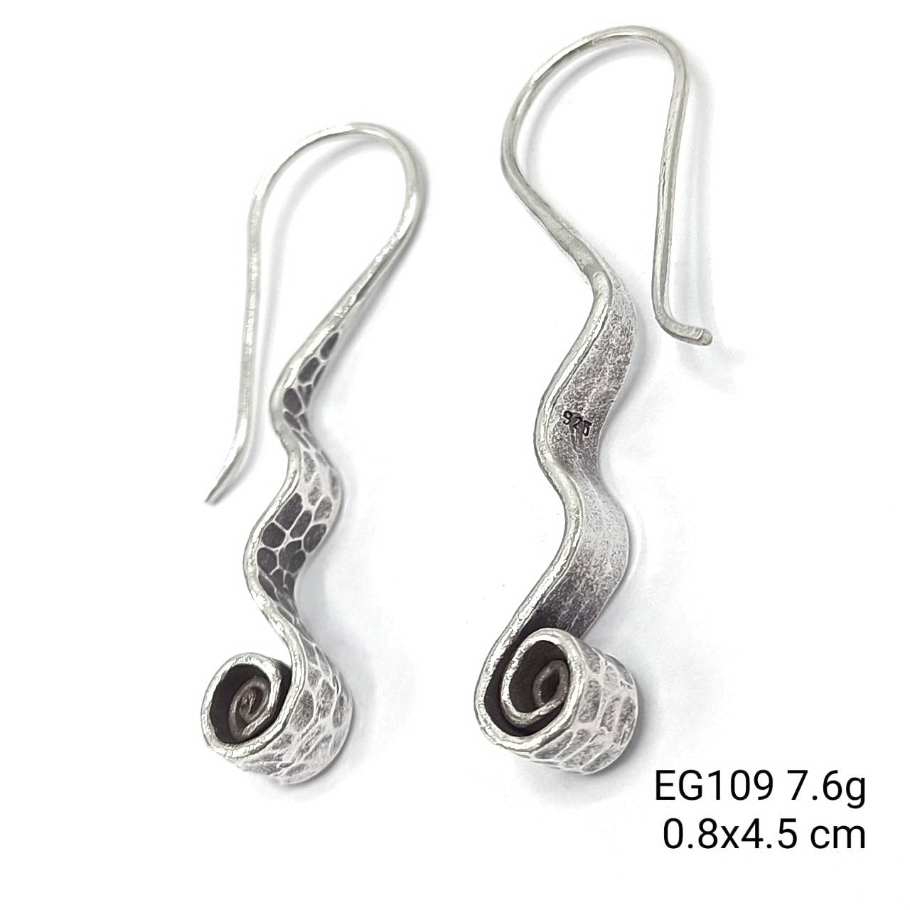 Minimalist magic with these silver earrings.