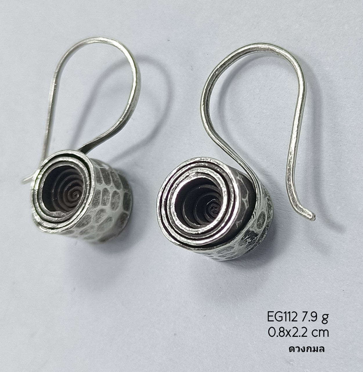 The daily essential: hang silver earrings.