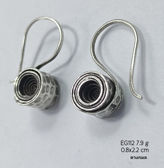 The daily essential: hang silver earrings.