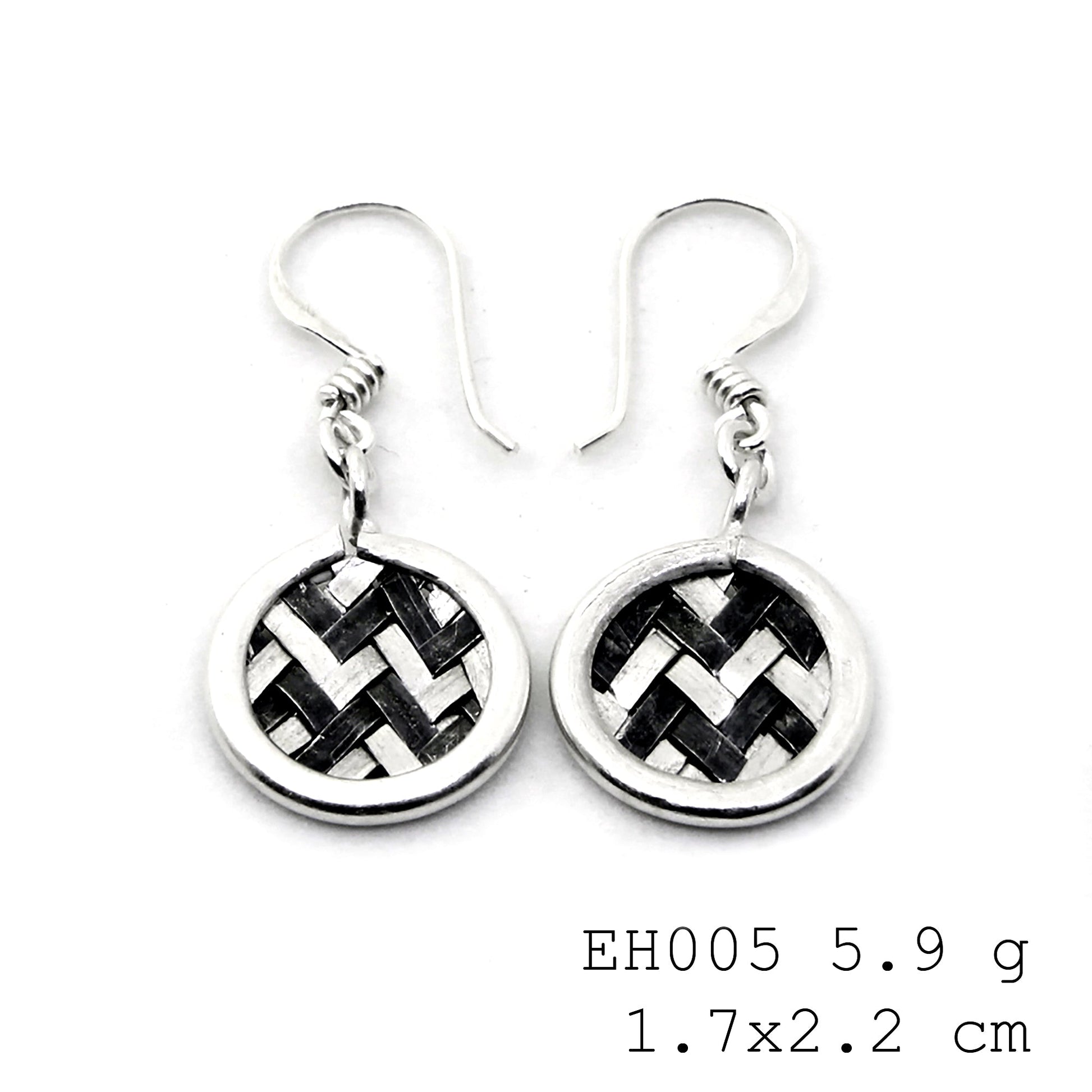 A classic twist on handmade silver earrings.