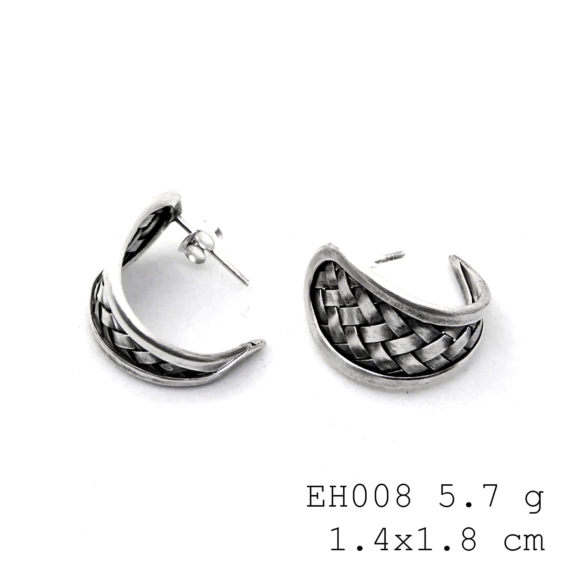 Discover the detail in these woven silver earrings.