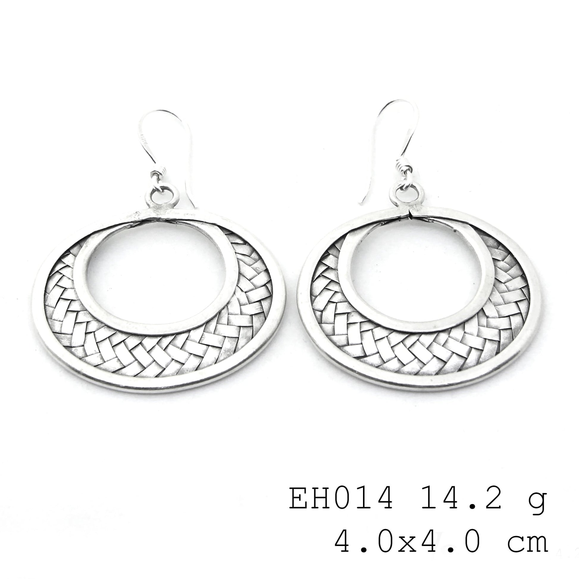 Purely refined: our woven silver earrings.