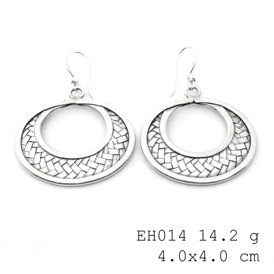 Purely refined: our woven silver earrings.