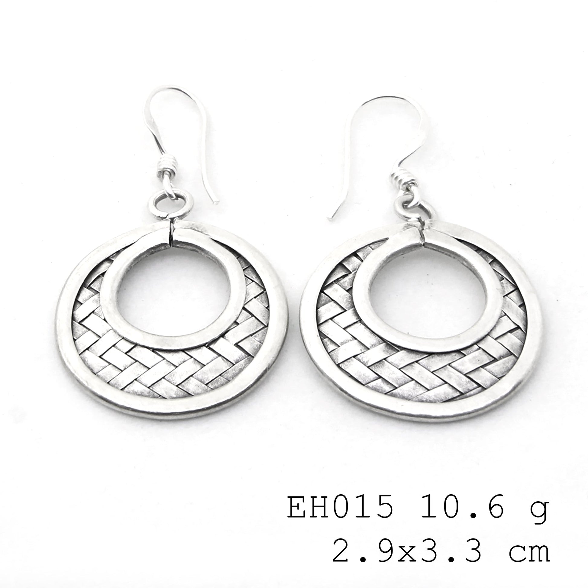 Woven wonders: pure silver earrings.
