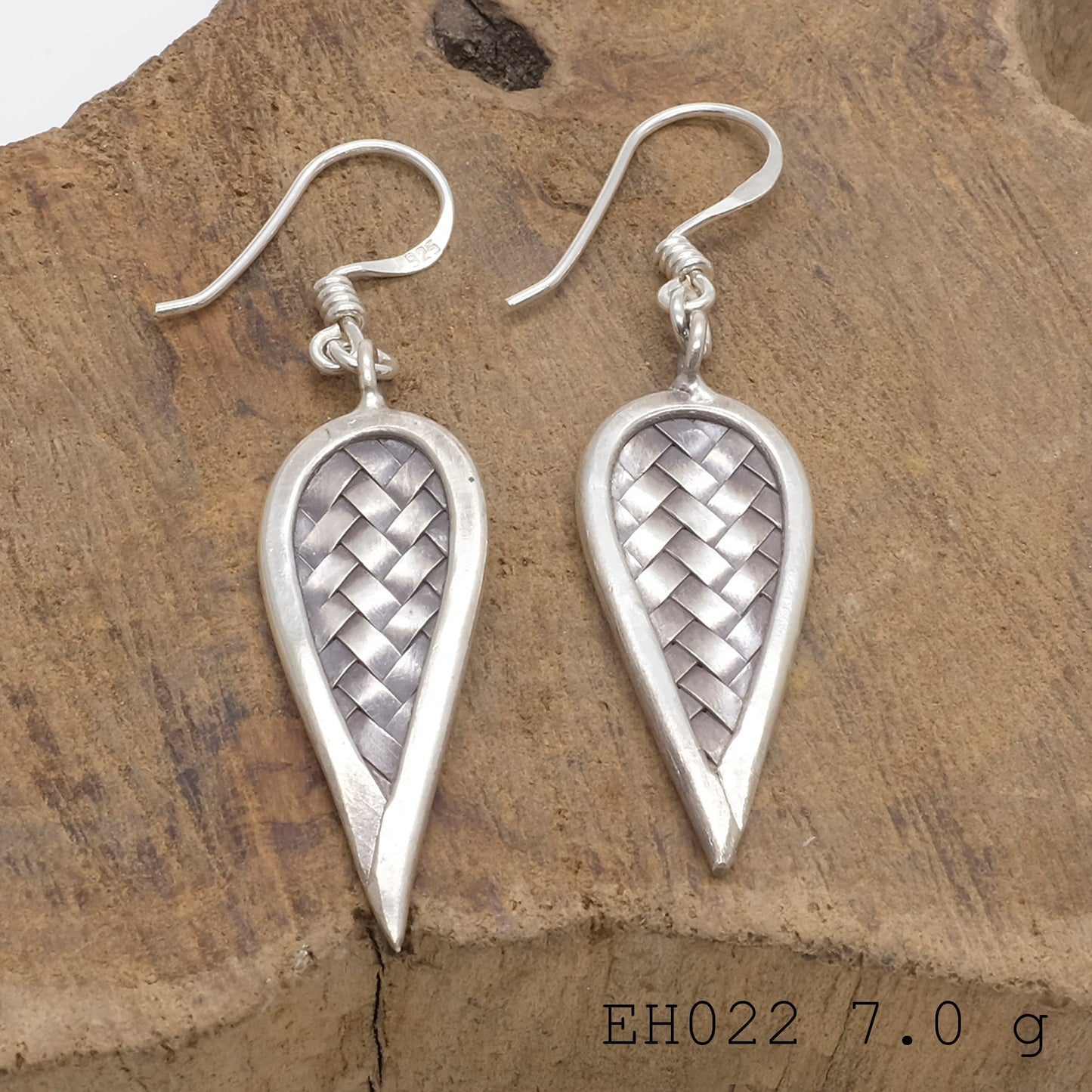 Boldly textured, purely silver earrings.